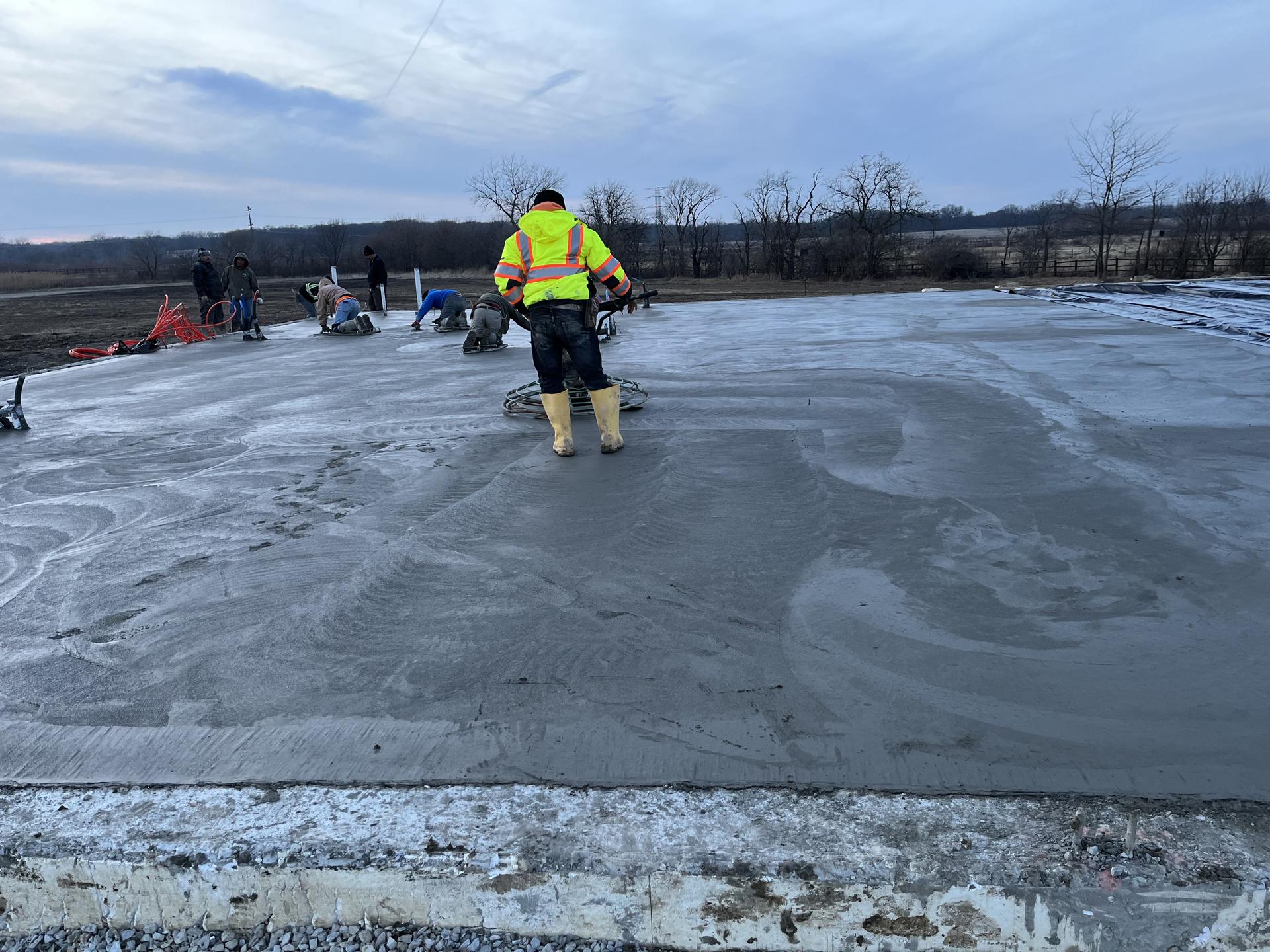 Power-trowel finishing large slab, Anderson Indiana