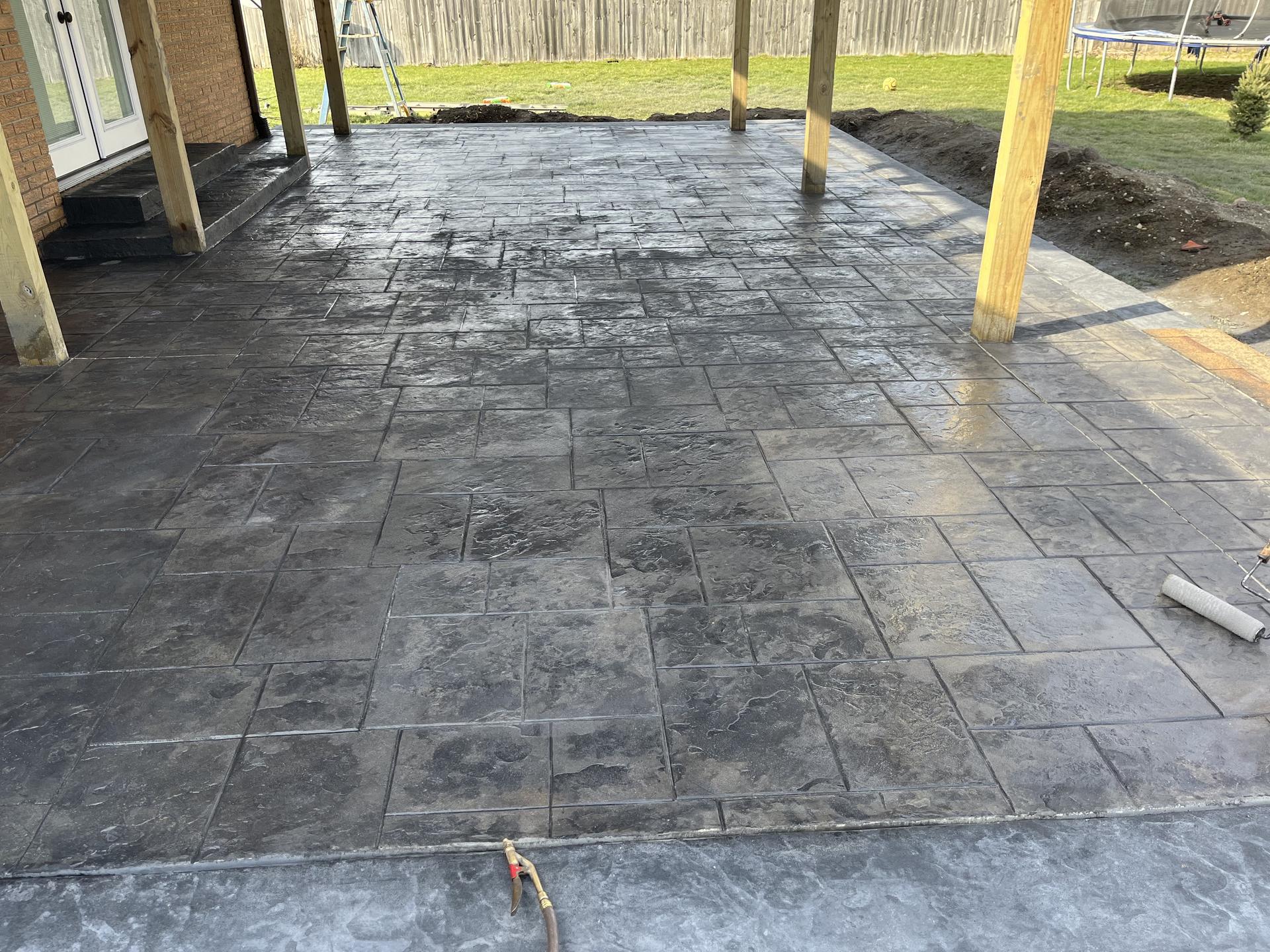Stamped patio under covered porch, Noblesville Indiana