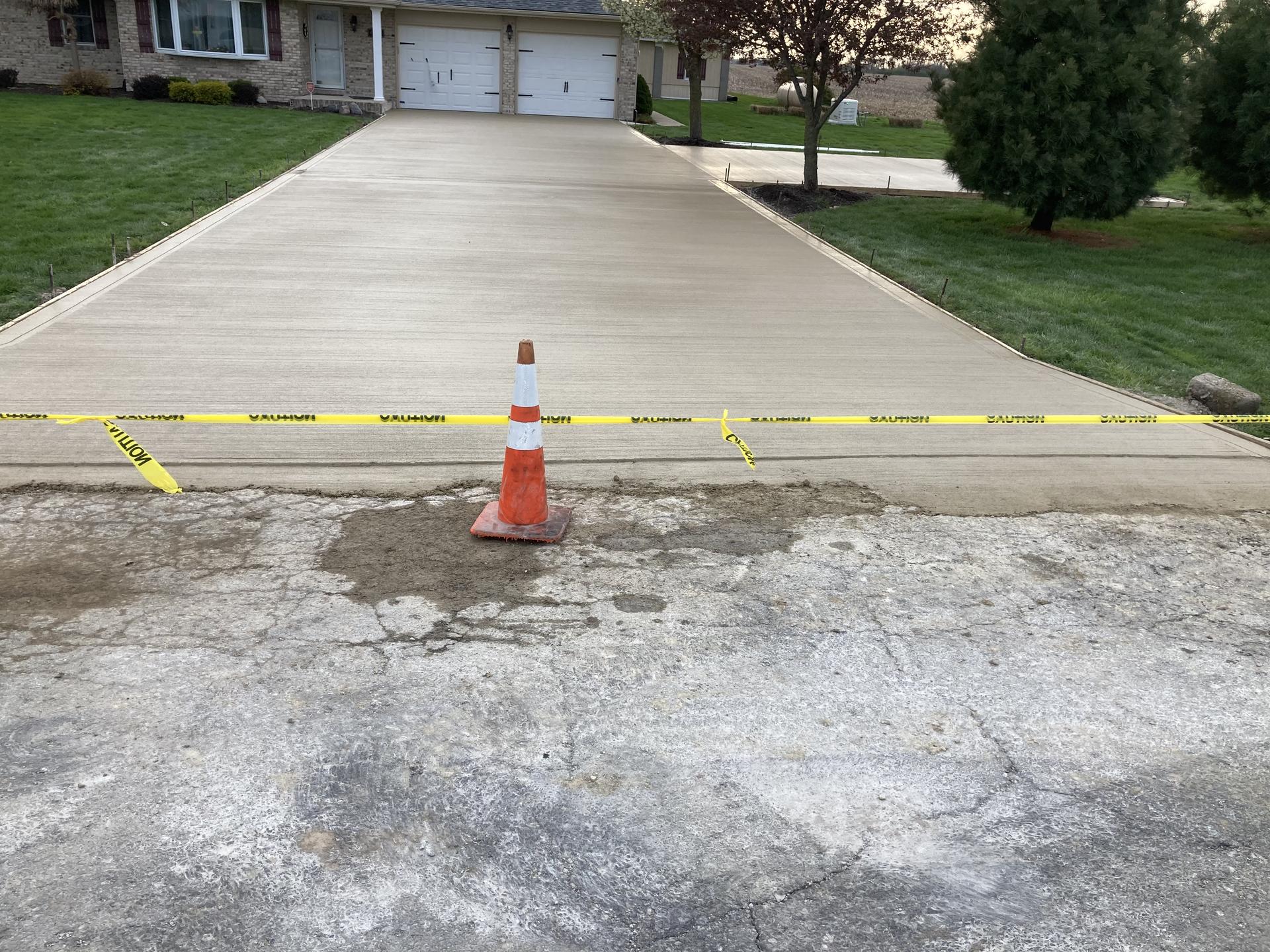 Completed driveway with caution tape, Noblesville Indiana