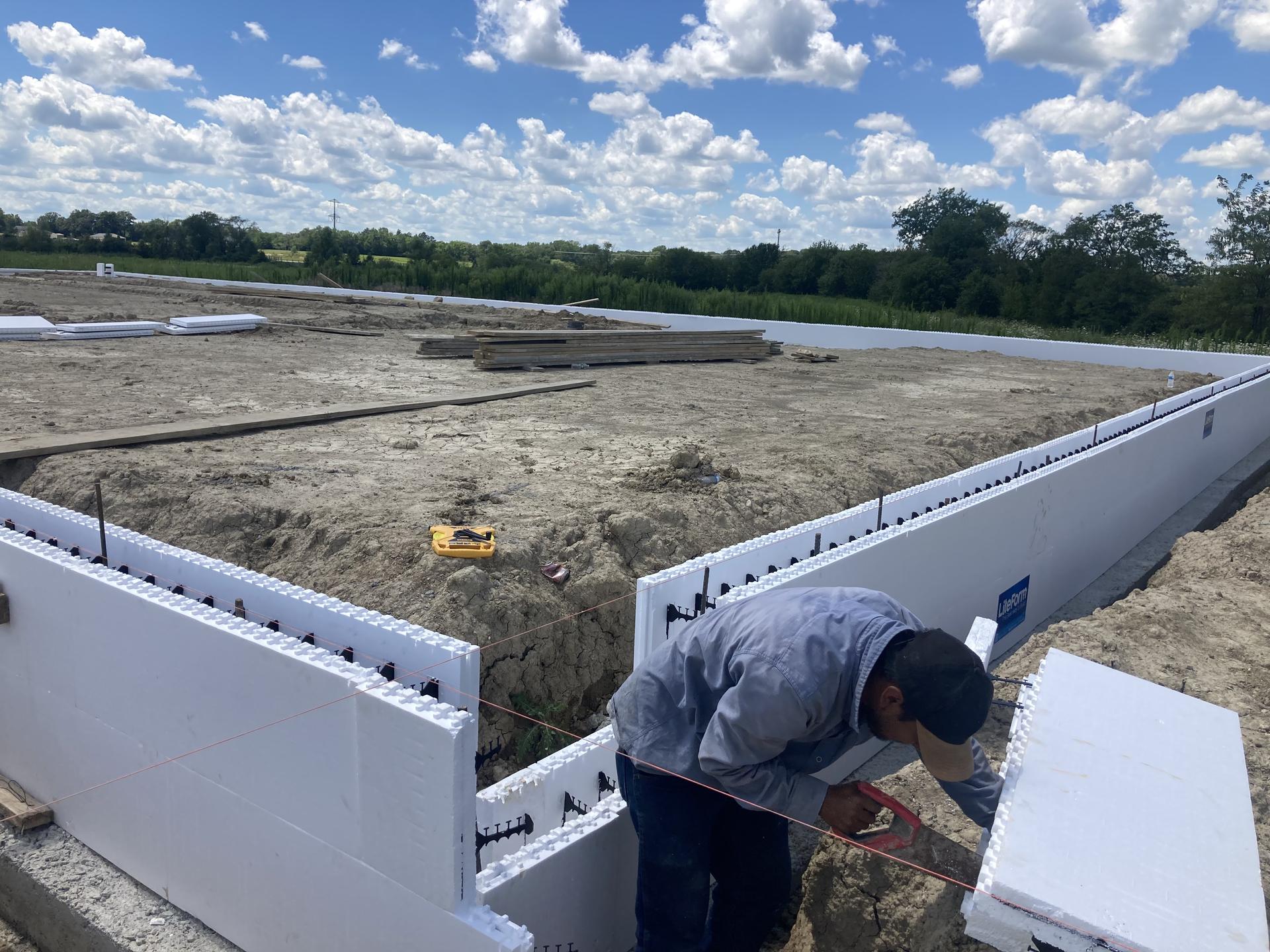 ICF block placement worker close-up, Anderson Indiana
