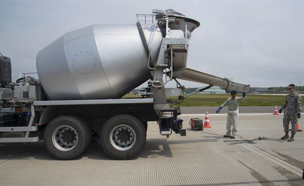 Concrete contractors truck ready to pour concrete for a parking lot